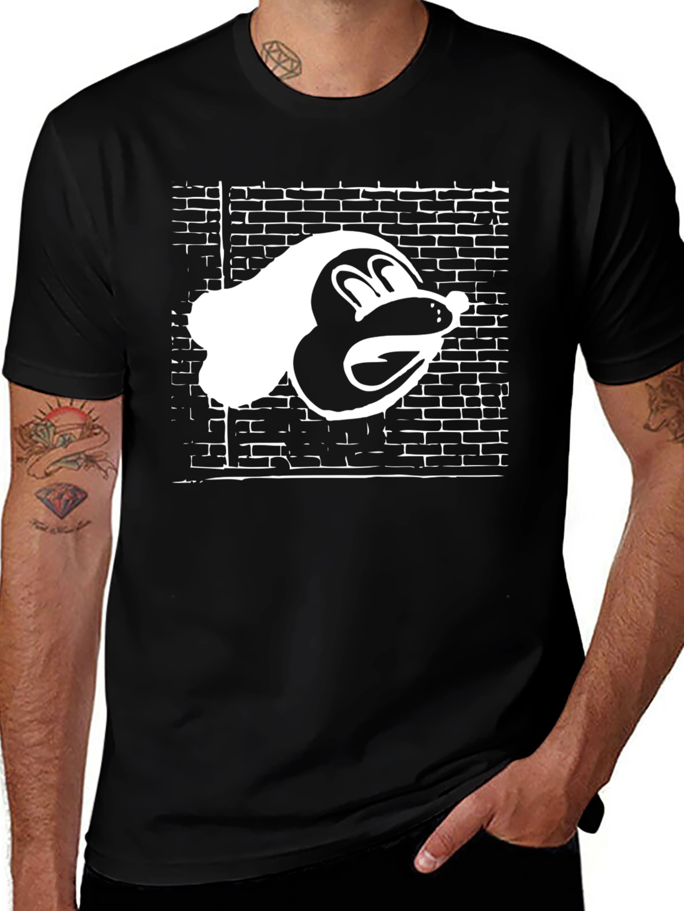 Graphic Tee: Toon Character on Brick Wall